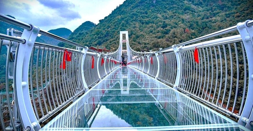 Indias first glass suspension bridge bajrang setu is located over the ganga river in rishikesh uttarakhand